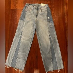 American Eagle Dreamy Drape low rise baggy jeans. Size 2 (26). New with tags